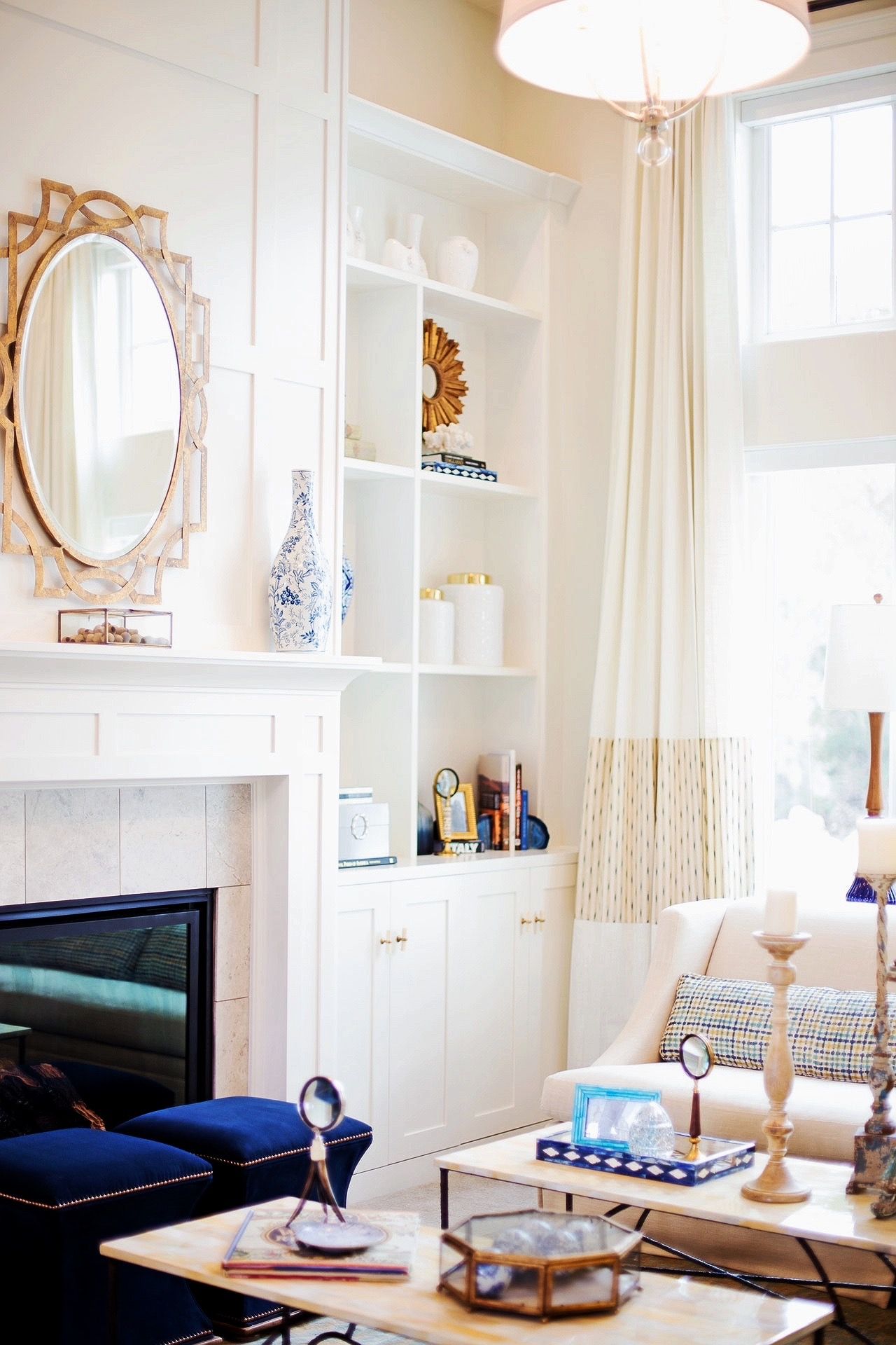 Living room with a fireplace, mirror and built-in shelves after automatic correction