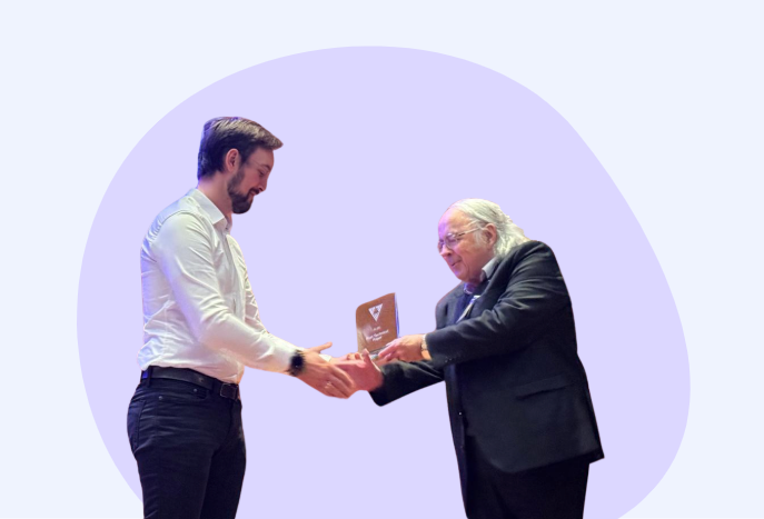 Jakob receiving the award