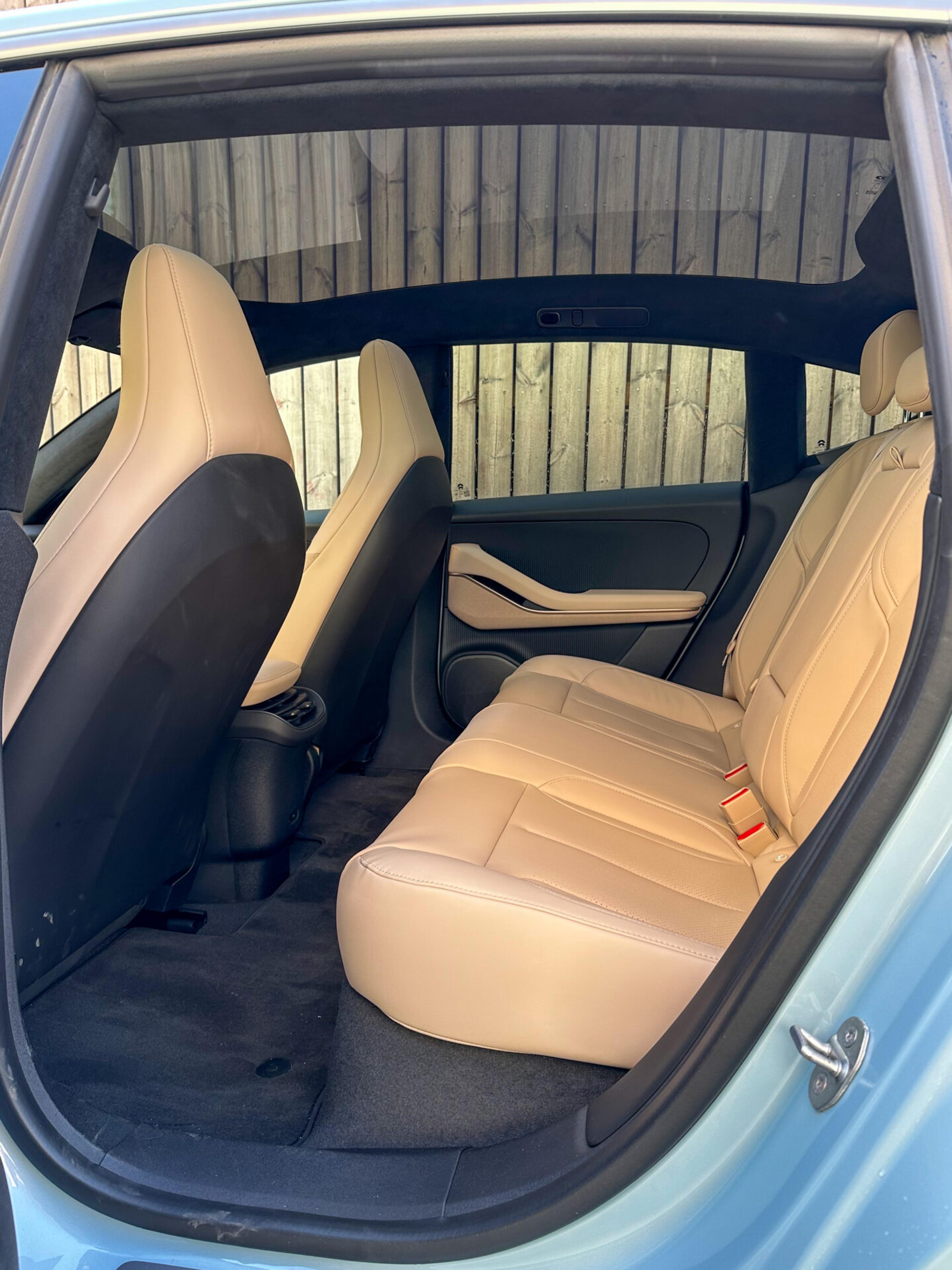 picture of the back seats of NIO's ET5 in beige leather