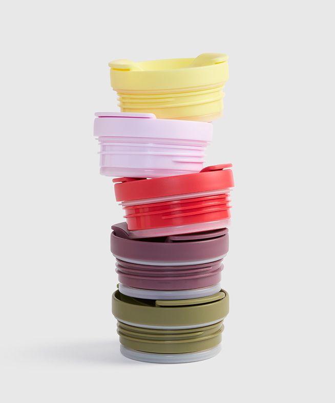 Stack of coffee cup lids
