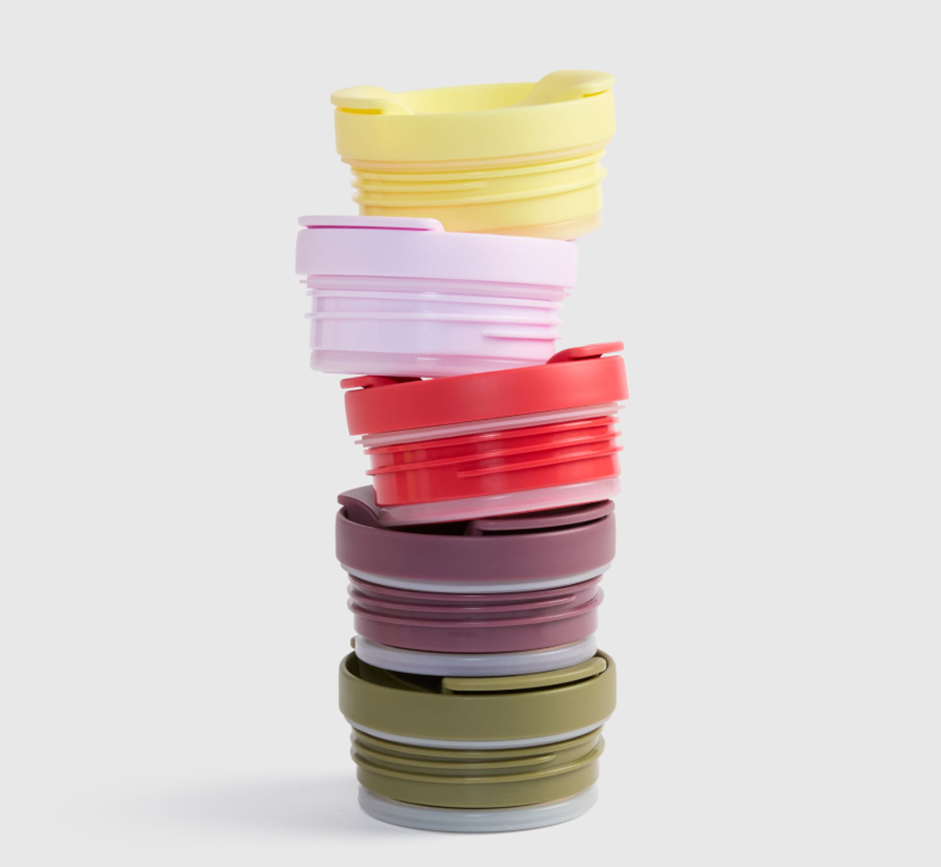 Stack of coffee cup lids
