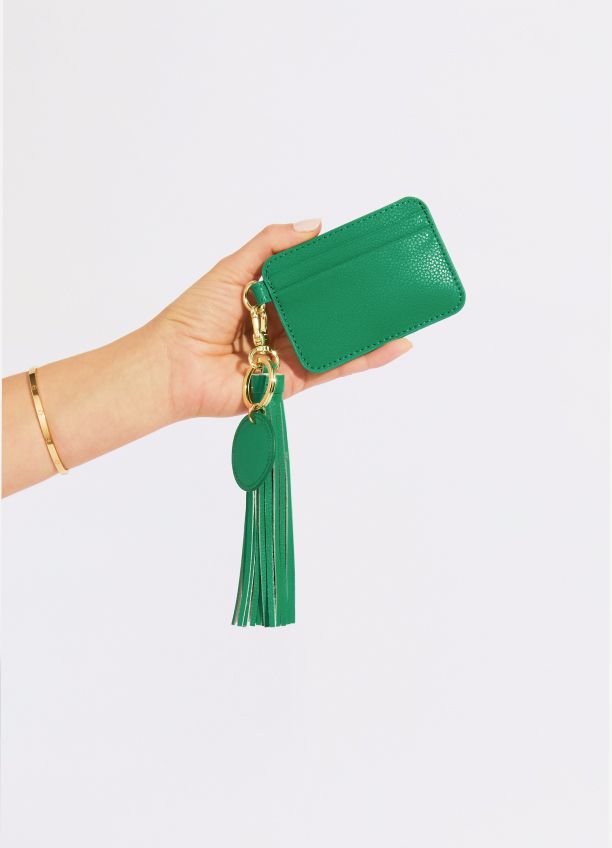 Hand holding an Emerald Green Leather Card Holder