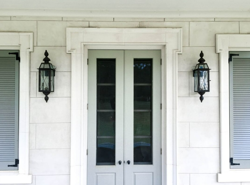 The CopperSmith Oakley Electric Coach Bars Top and Bottom Finial Wall Mount Lifestyle 4