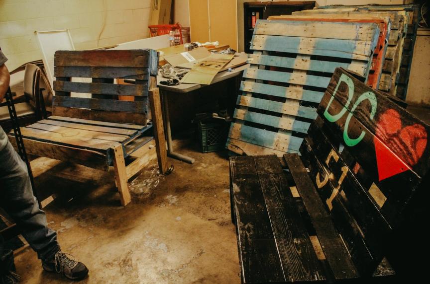 Boe’s workshop where he turns discarded pallets into benches with a message.