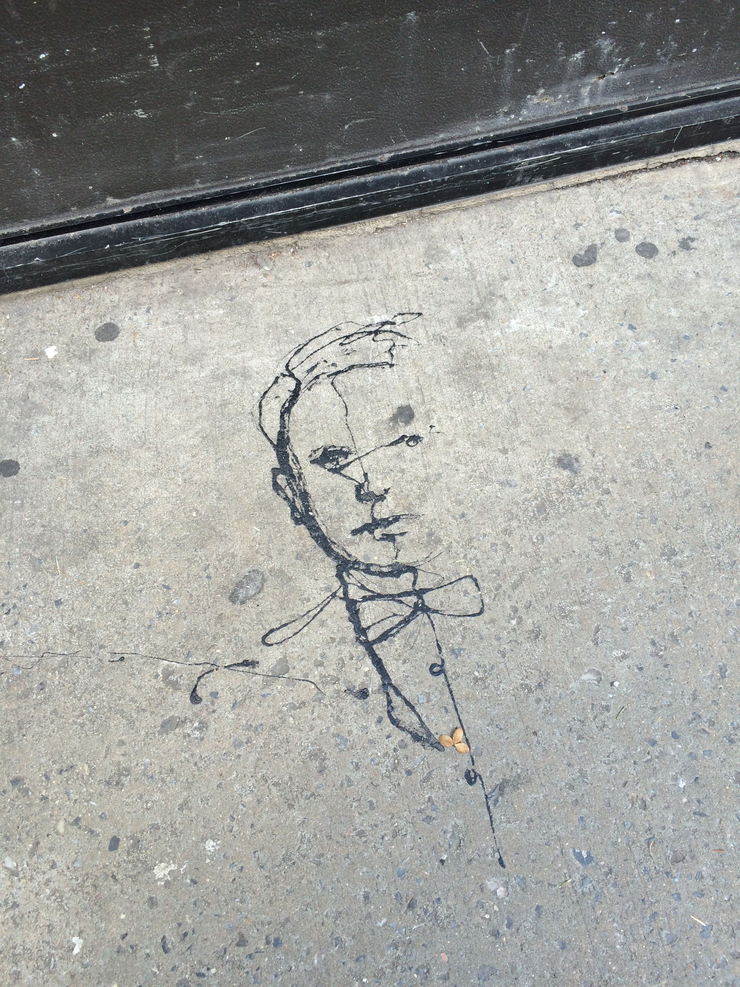 scribbled man on sidewalk