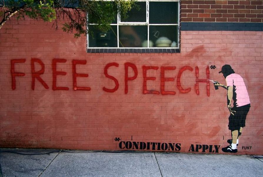 street art reading free speech, conditions apply