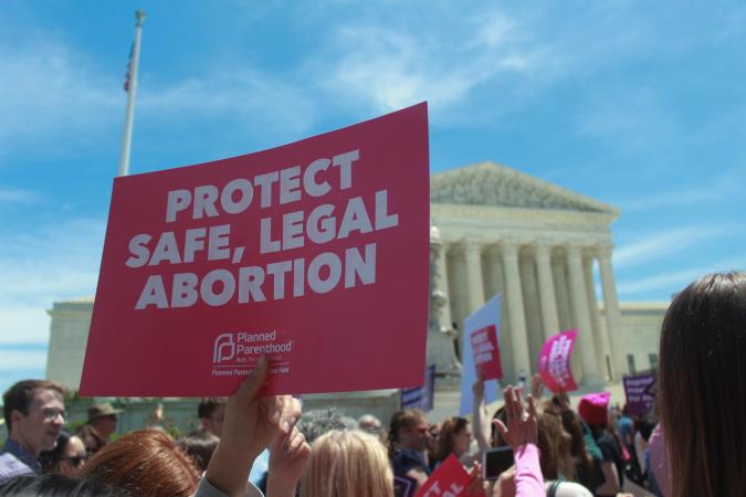 protect abortion access sign