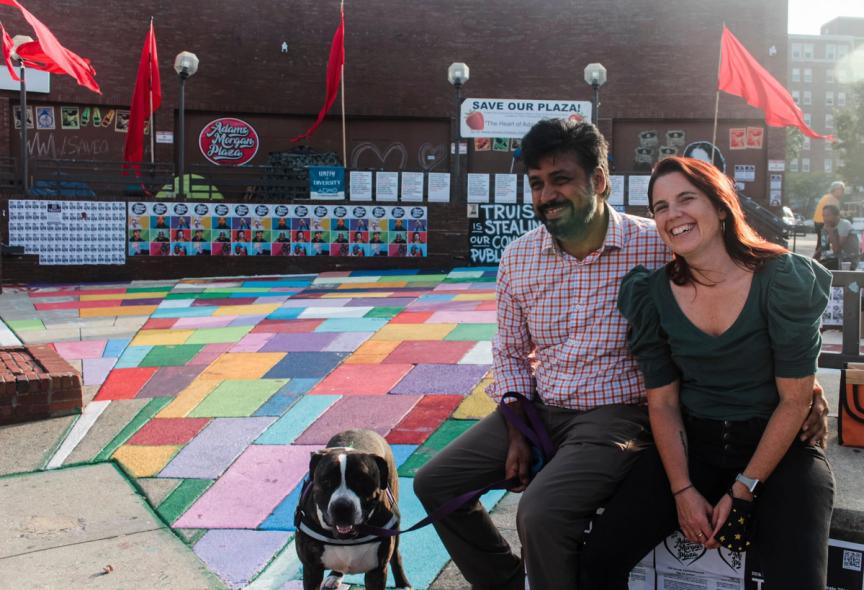 Co-facilitator with Adams Morgan for Reasonable Development Vikram Surya Chiruvolu sits in AdMo plaza with filmmaker and activist Kristin Adair and plaza dog Reggie. Eleanor Goldfield | ArtKillingApathy.com