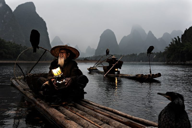 China 2020, fisherman with cormorant of Dong ethnicity