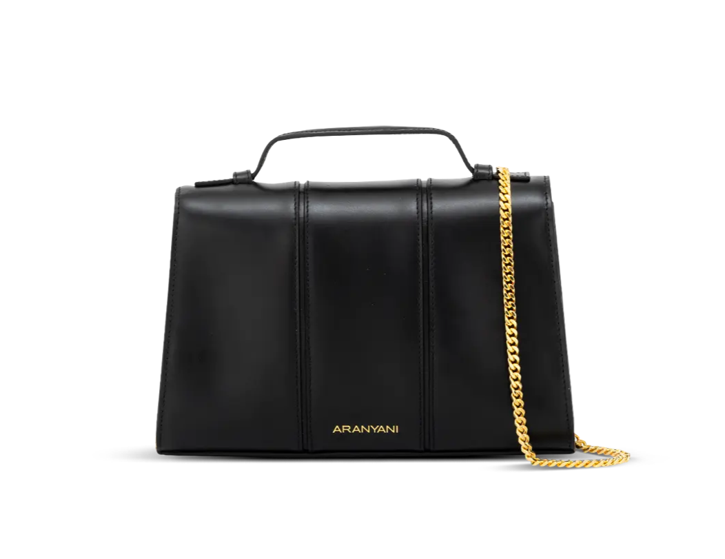 The Aella Monogram Luxury Handbag in Obsidian shade with a 24 K gold plated strap