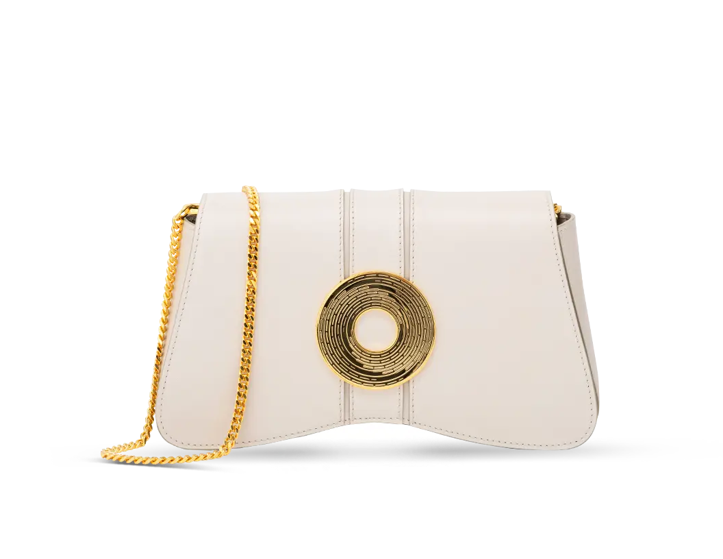 Aranyani Marquise Clutch in Sand Shade with a 24K gold plated Monogram Medallion
