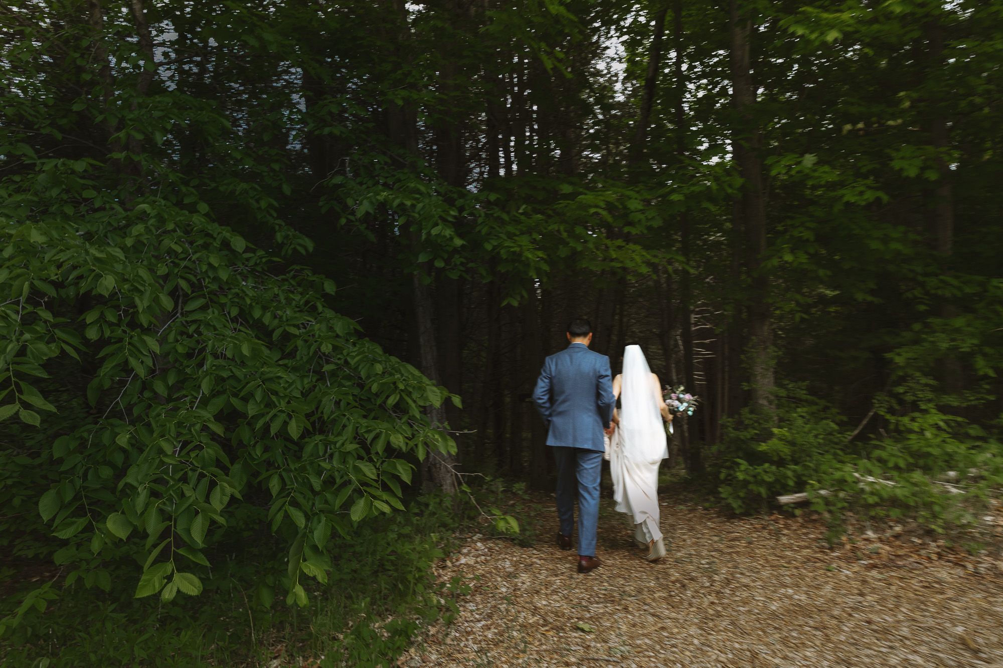 Editorial wedding portrait of couple in Toronto with natural movement