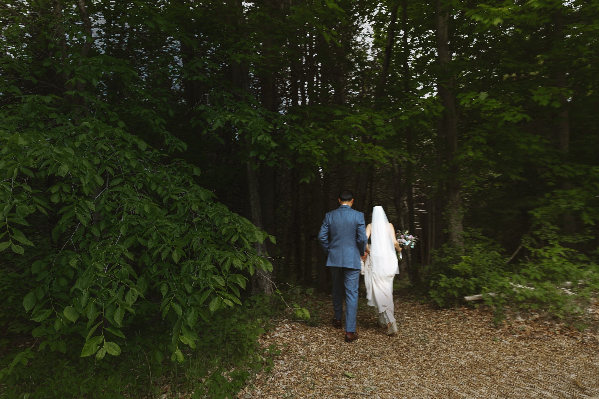 Editorial wedding portrait of couple in Toronto with natural movement