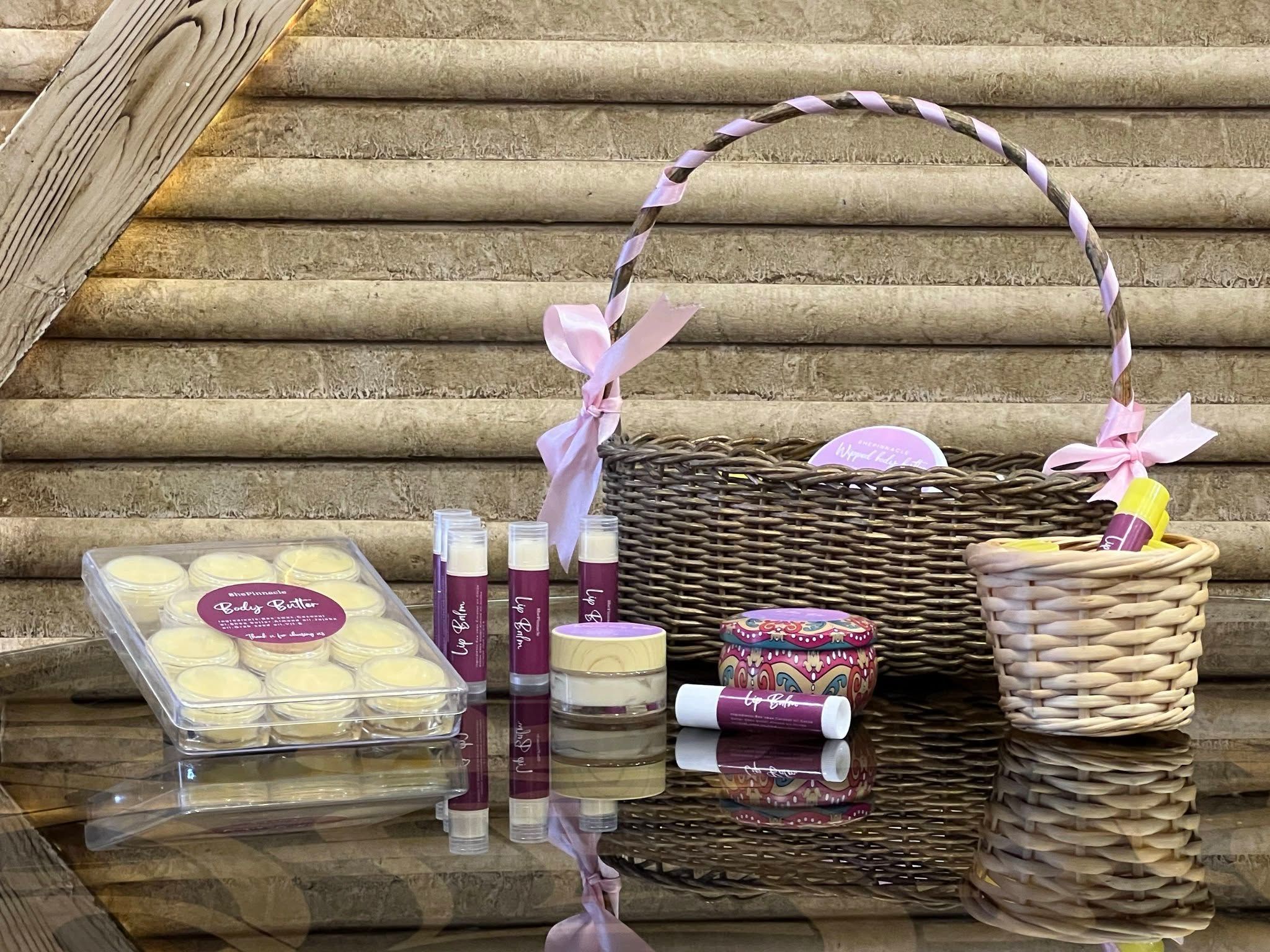 Women artisans creating skincare products in Alexandria.