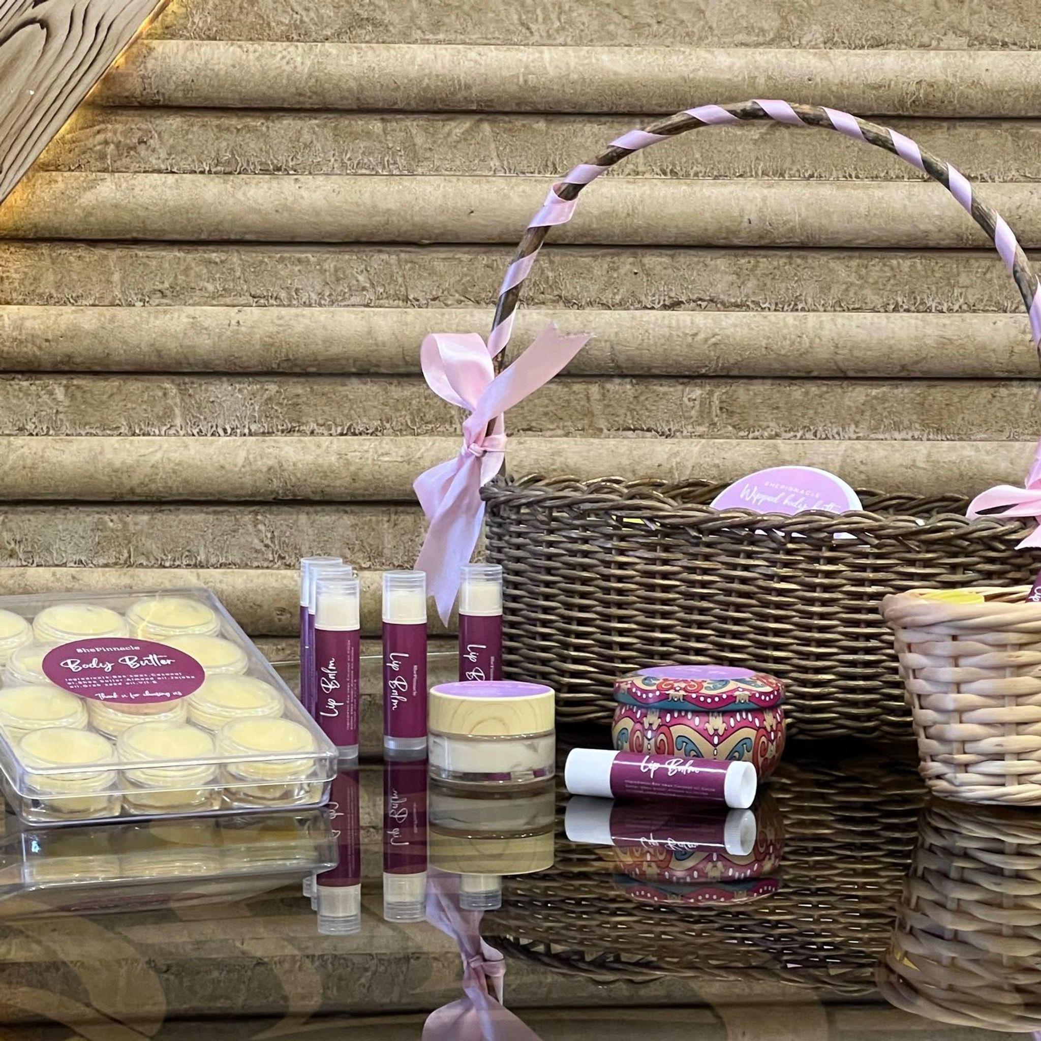 Women artisans creating skincare products in Alexandria.