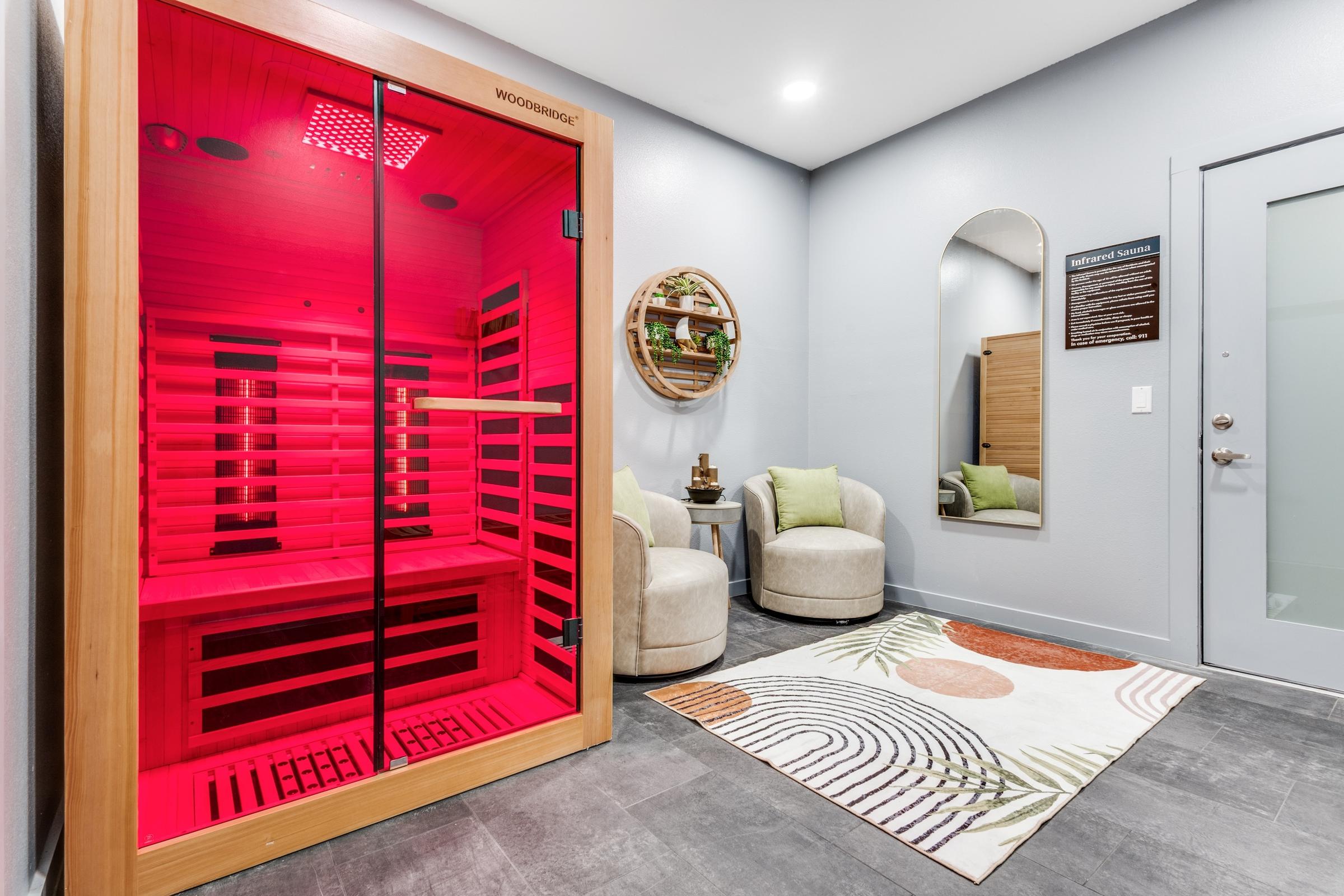 Infrared sauna spa amenity with relaxation seating in luxury apartment community in Melissa, Texas