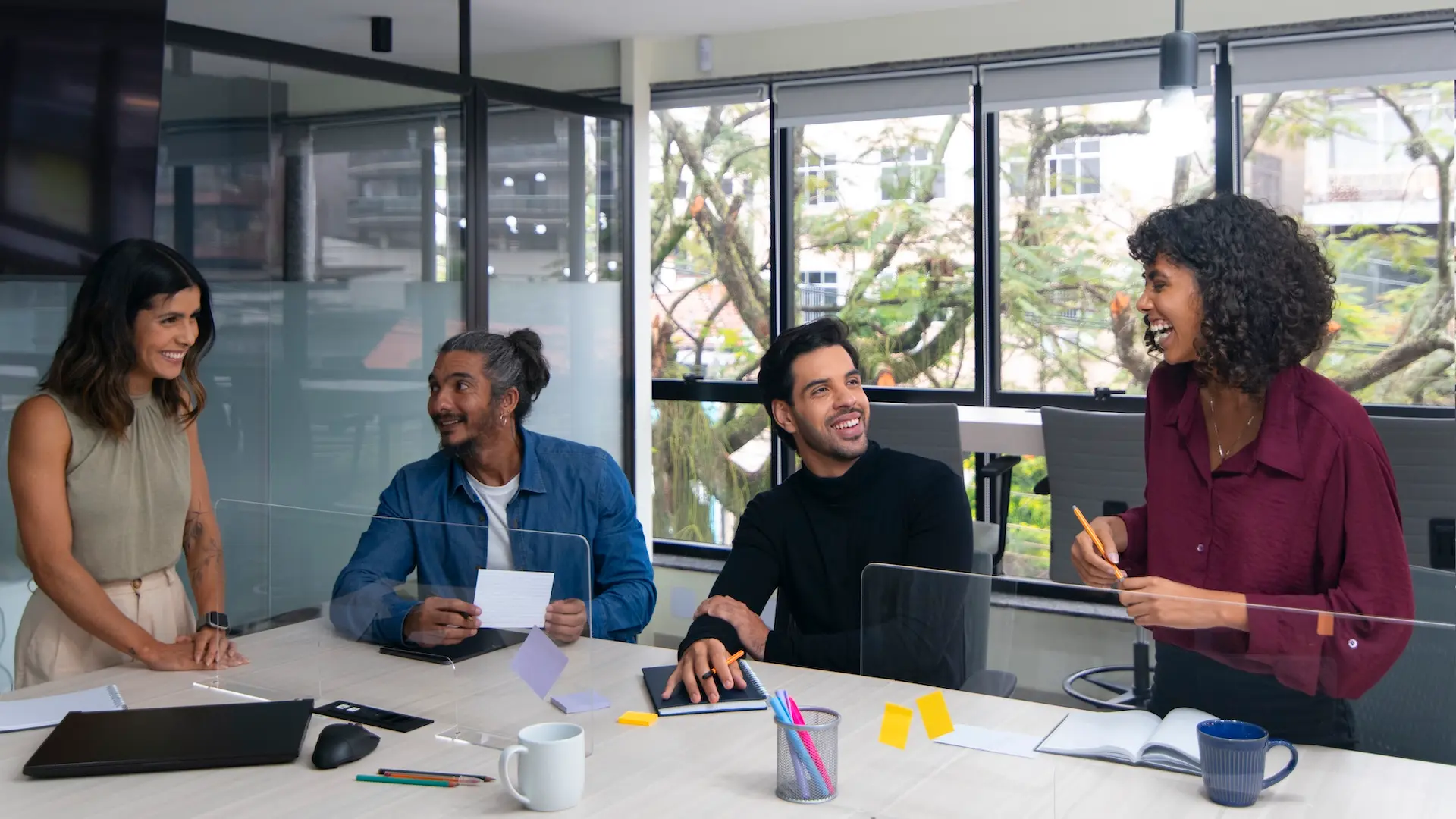 Diverse team collaborating in a modern, bright office space