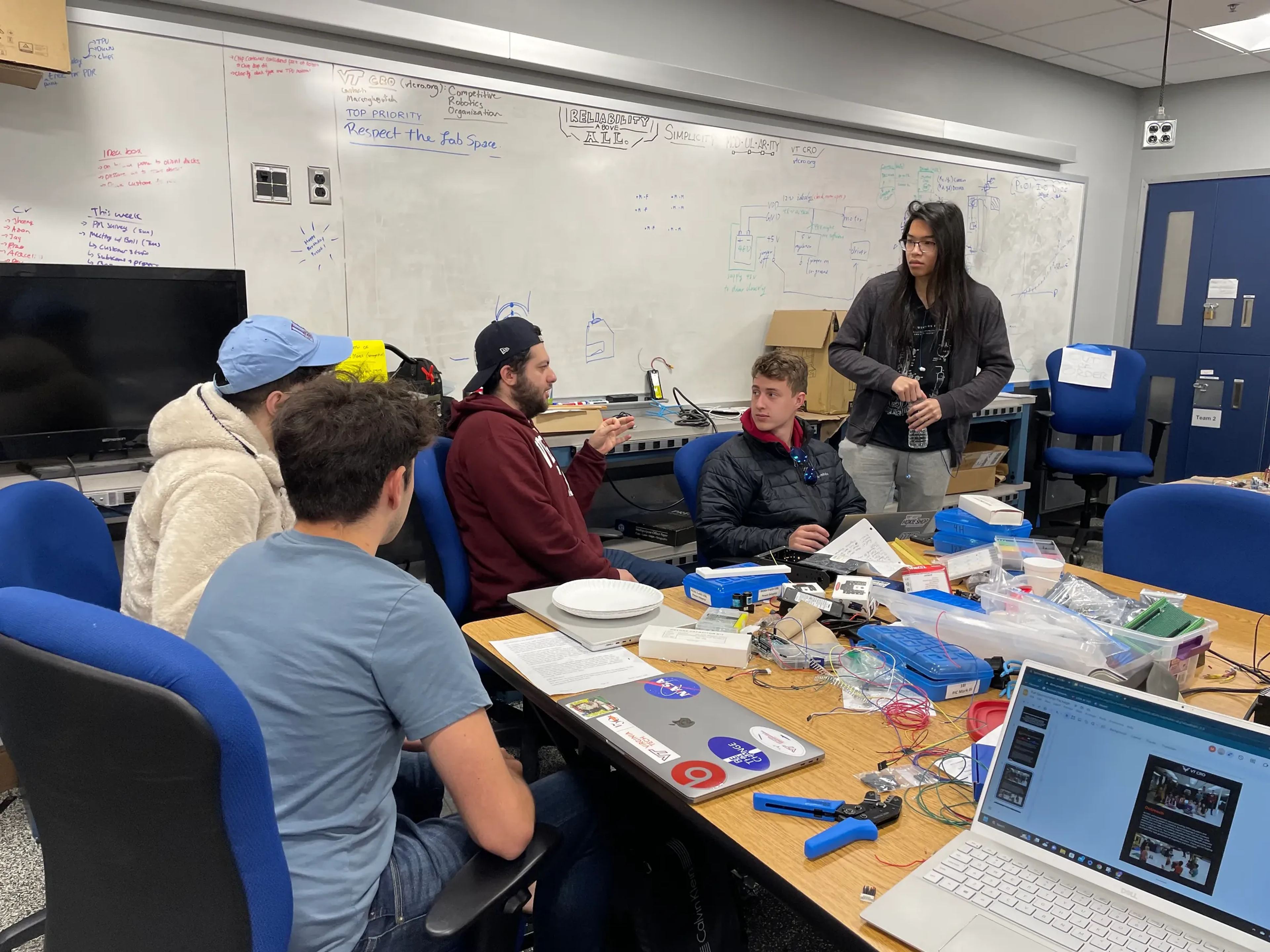 Members working at lab tables