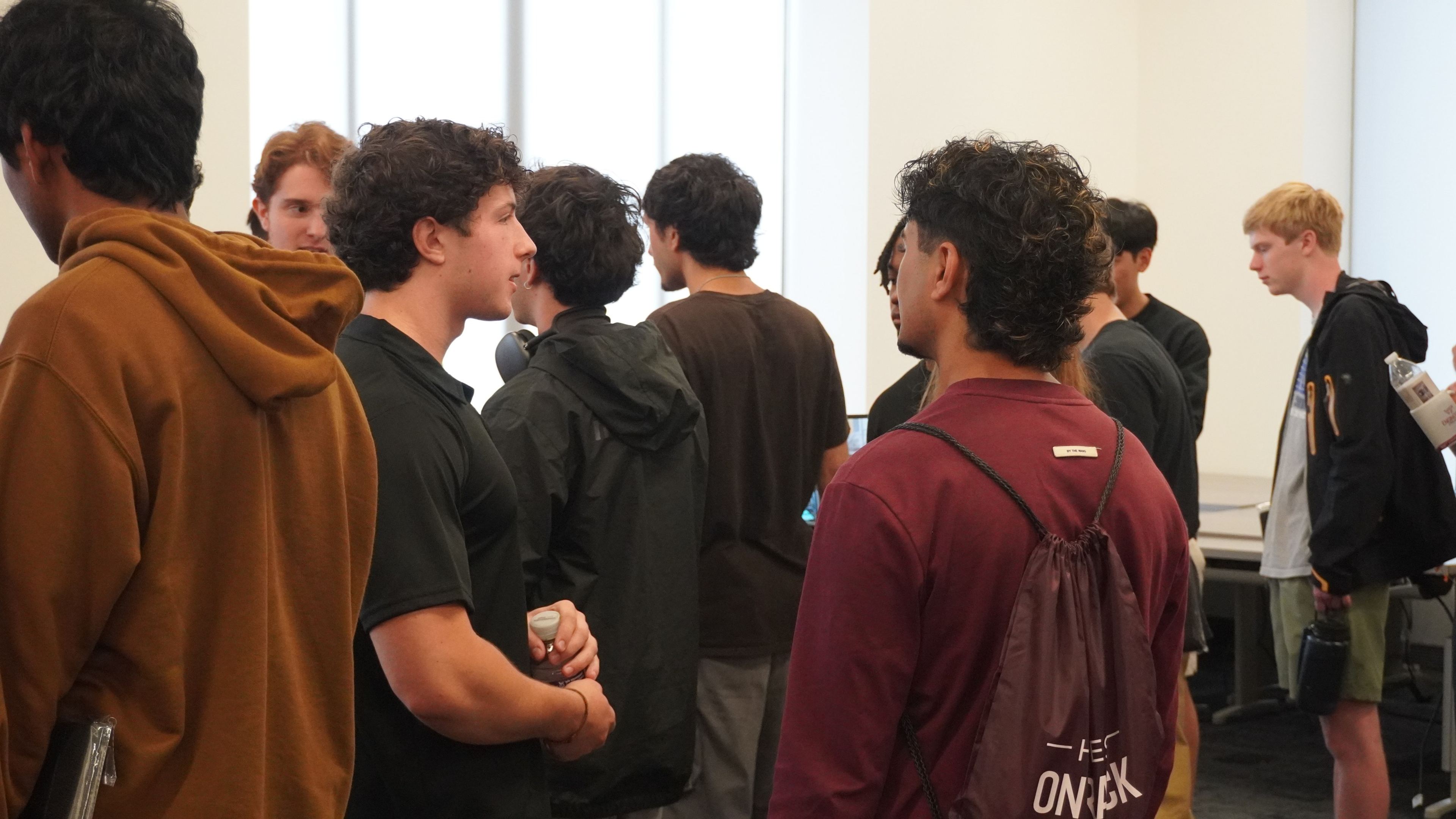 Students gathered at a VT CRO showcase