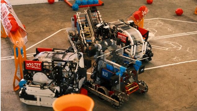 VEX U robots on the competition field