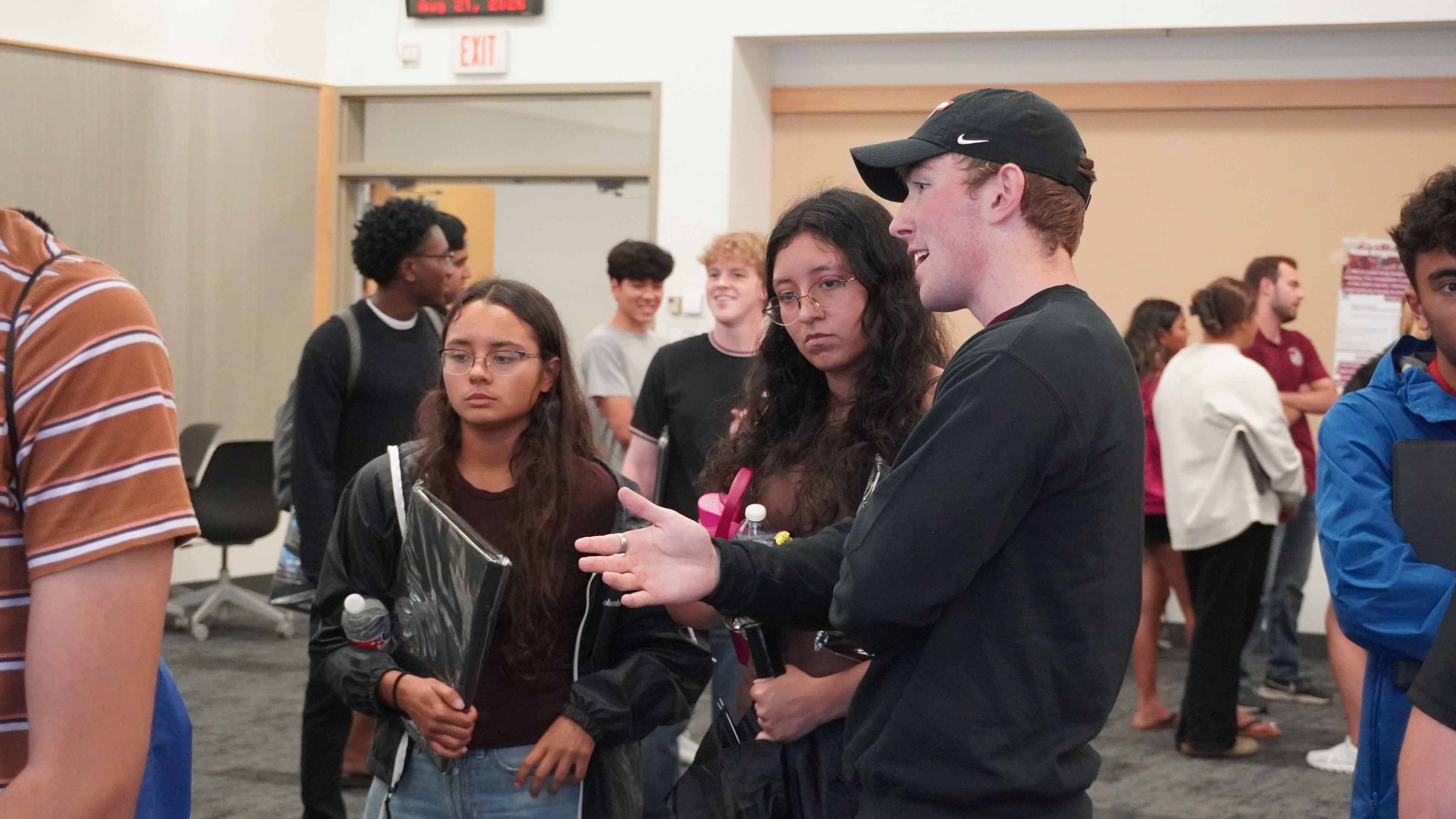 A member explaining VT CRO to students