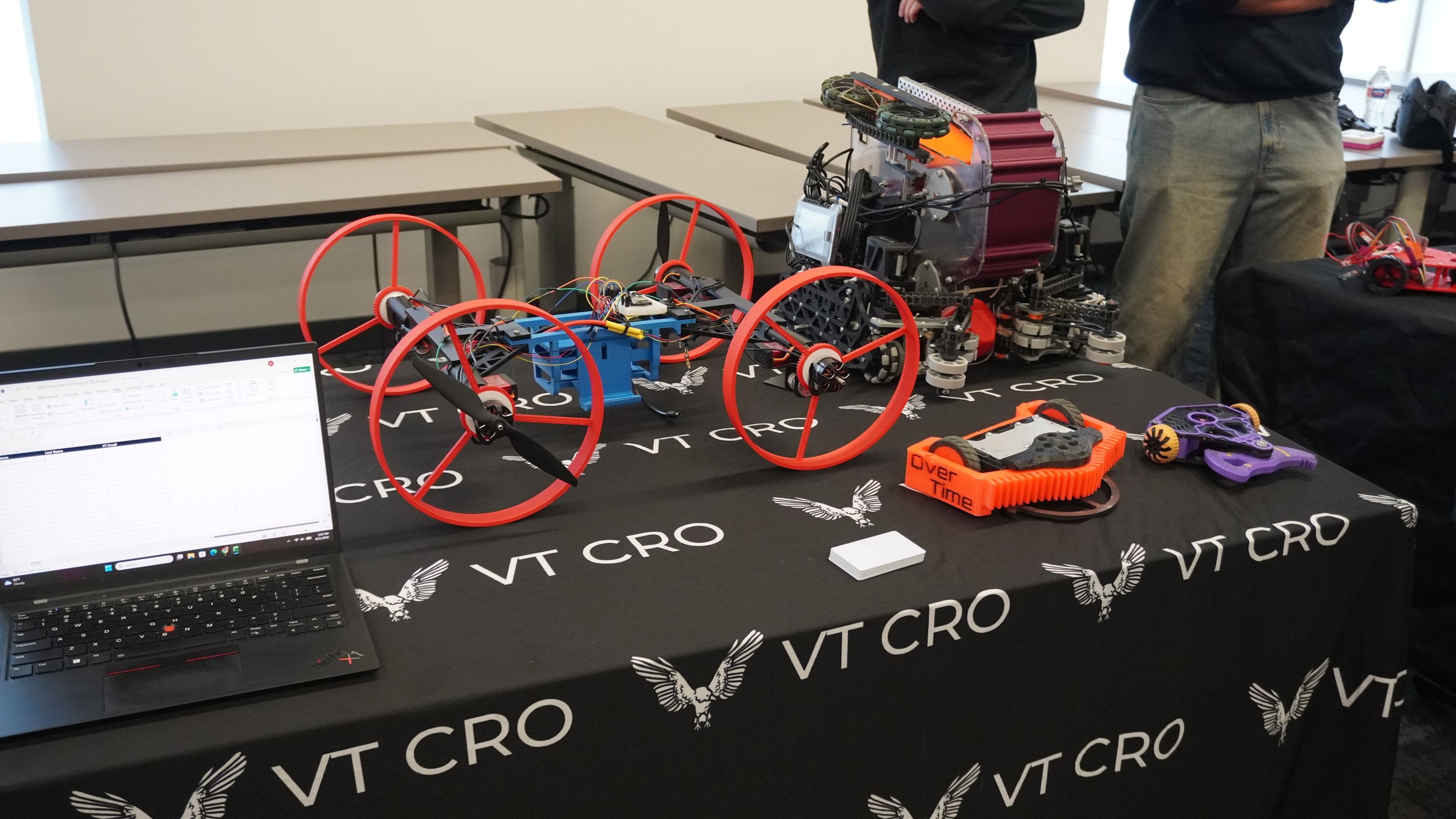 VT CRO robots on display on a table with a VT CRO tablecloth