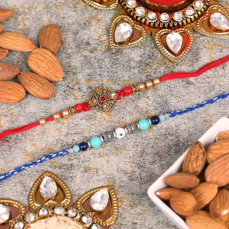 kundan-and-evil-eye-rakhi-with-almonds-set-of-2_1.webp
