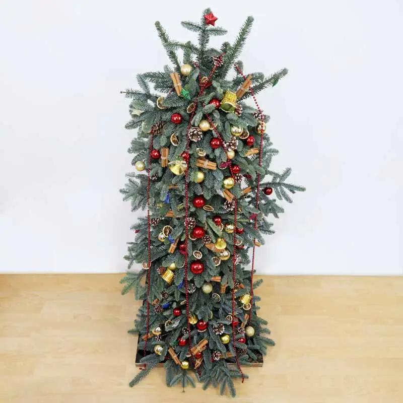 Christmas Tree Arrangement in Red Theme - Gifts gift from Buy Any Flowers Dubai in Al Quoz Industrial Area 4, Dubai, UAE
