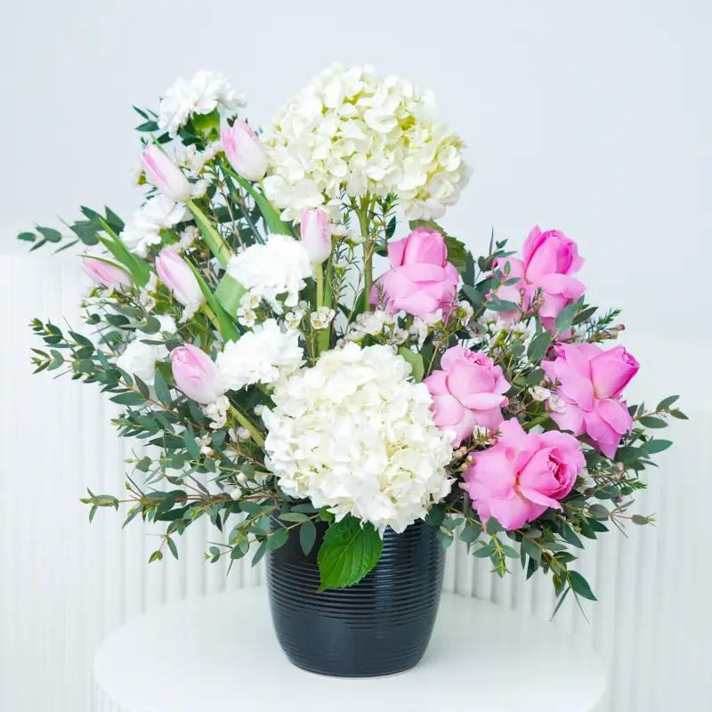 Elegance Flowers in Black Ceramic Pot and Teddy - Gift Sets gift from Buy Any Flowers Dubai in Al Quoz Industrial Area 4, Dubai, UAE - image 2