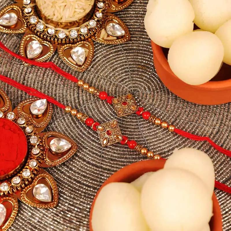 Antique Kundan Rakhi and Tin Rasgulla Set of 2 - Gifts gift from Buy Any Flowers Dubai in Al Quoz Industrial Area 4, Dubai, UAE