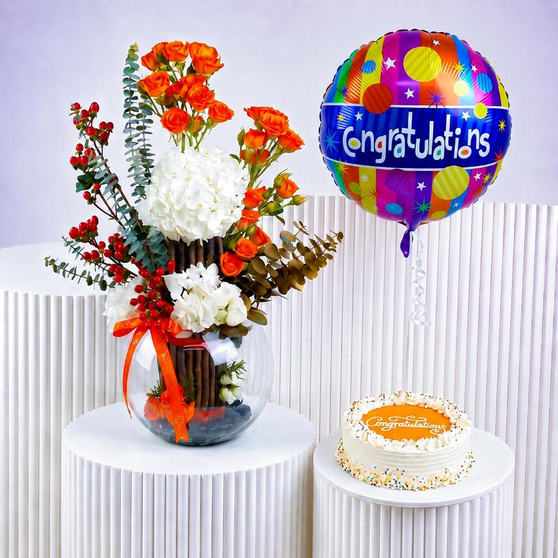 Congrats Ember Flower with Cake and Balloon in Dubai
