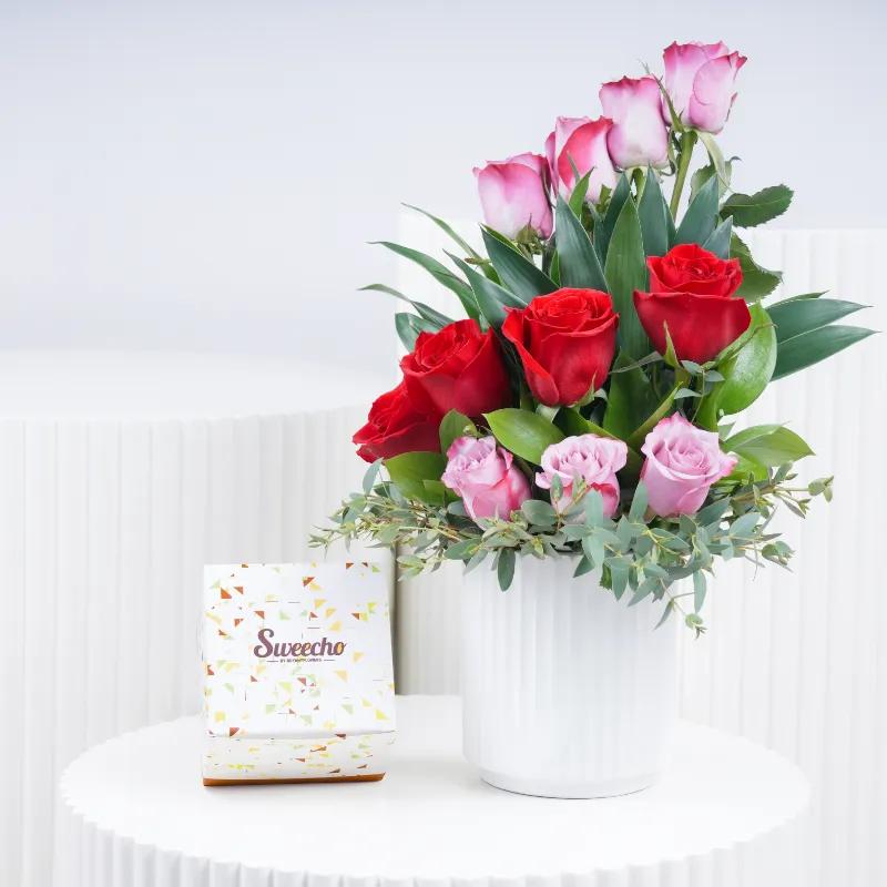 Beauty 11 Red and Purple Roses With Chocolate - Gift Sets gift from Buy Any Flowers Dubai in Al Quoz Industrial Area 4, Dubai, UAE