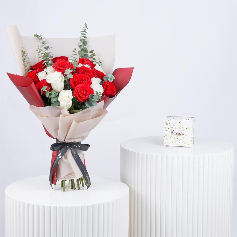 Beauty in Red and White 21 Roses Bouquet with Chocolates - Gift Sets gift from Buy Any Flowers Dubai in Al Quoz Industrial Area 4, Dubai, UAE