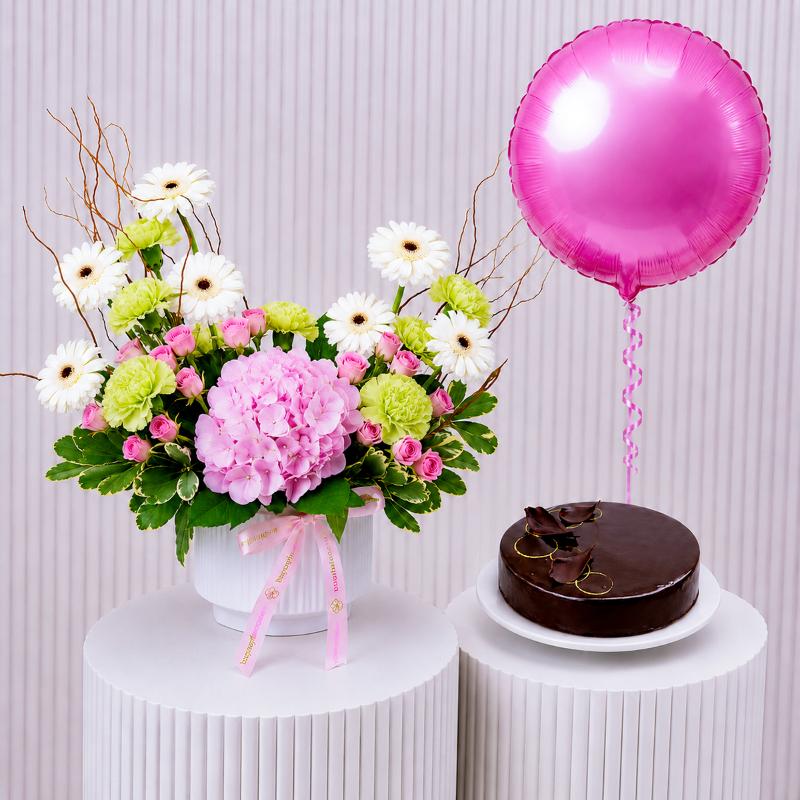 Innocence Flowers with Cake and Balloon - Gift Sets gift from Buy Any Flowers Dubai in Al Quoz Industrial Area 4, Dubai, UAE