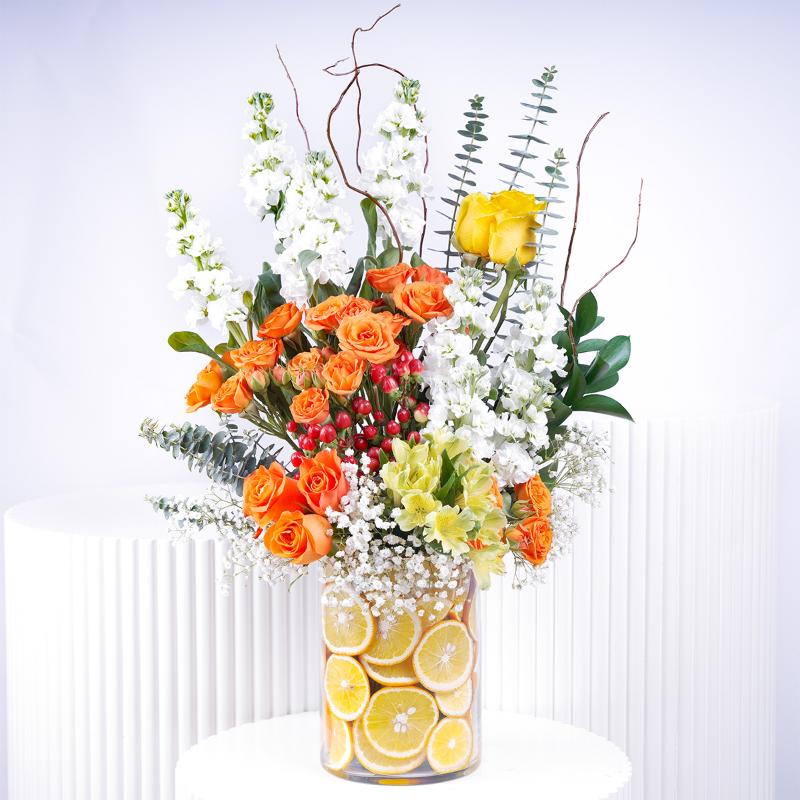 Citrus Glow Glass Vase Arrangement - Flowers gift from Buy Any Flowers Dubai in Al Quoz Industrial Area 4, Dubai, UAE