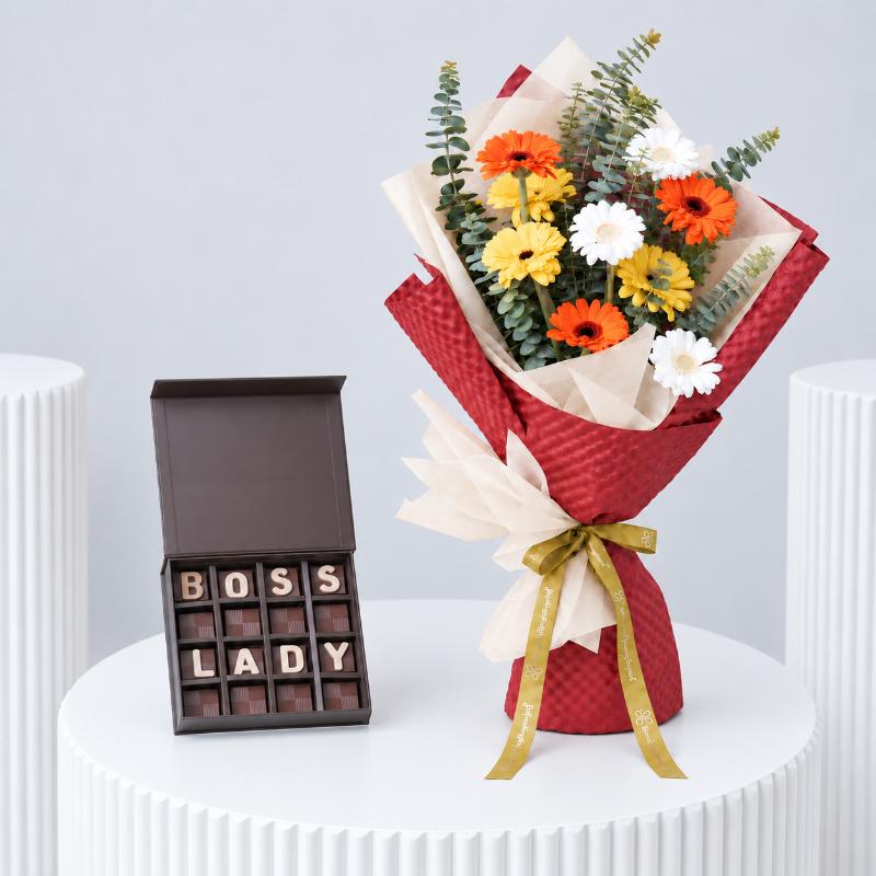 Glow 9 Gerberas Bouquet With Chocolate - Gift Sets gift from Buy Any Flowers Dubai in Al Quoz Industrial Area 4, Dubai, UAE