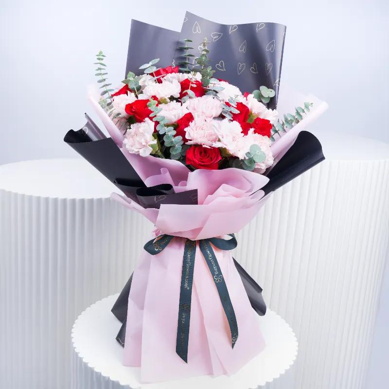 Queen 21 Red Roses and Pink Carnations Bouquet - Flowers gift from Buy Any Flowers Dubai in Al Quoz Industrial Area 4, Dubai, UAE