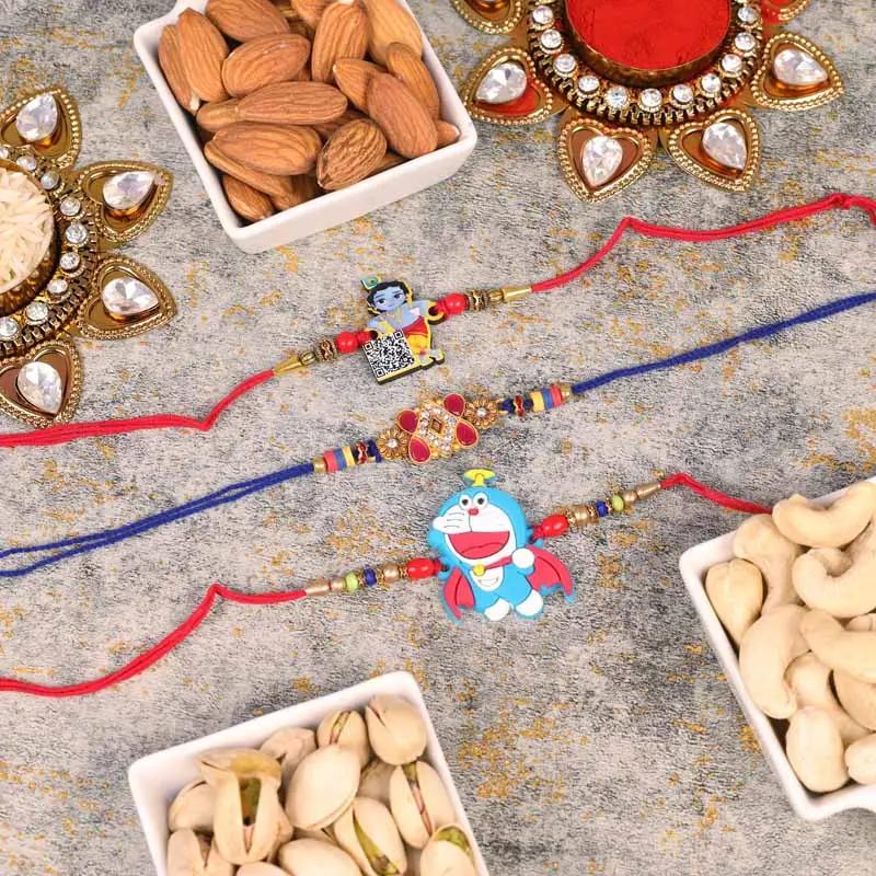 kundan-doremon-and-krishna-rakhi-with-dry-fruits-set-of-3_1.webp