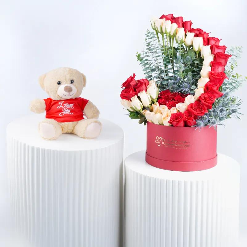 Velvet Blush 65 Roses in Box and Teddy - Gift Sets gift from Buy Any Flowers Dubai in Al Quoz Industrial Area 4, Dubai, UAE