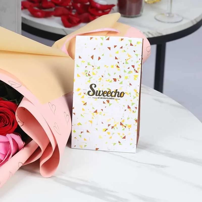Cutie Pie 7 Roses Bouquet and Sweecho Chocolates 100gm thumbnail 2