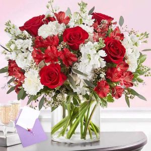 red-n-white-flower-in-vase-with-greeting-card_1.webp