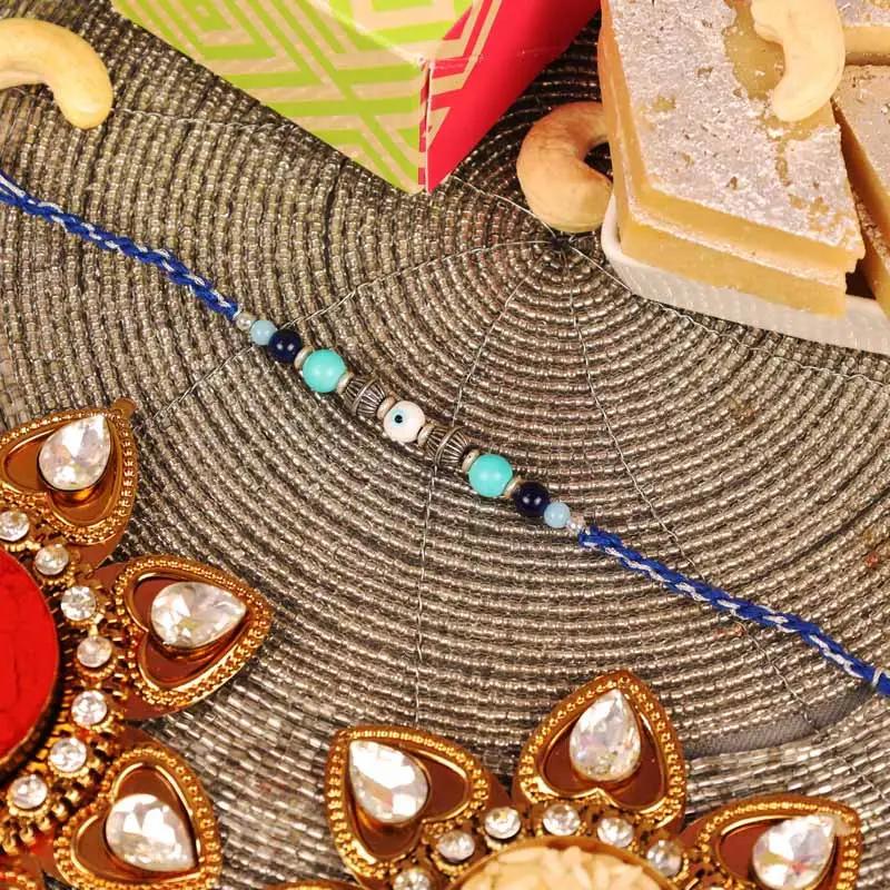 Evil Eye Rakhi and Kaju Katli thumbnail 2