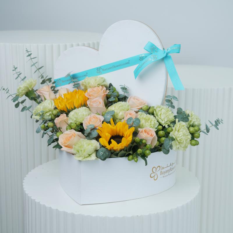 Sunshine Heartshape Flower Box - Flowers gift from Buy Any Flowers Dubai in Al Quoz Industrial Area 4, Dubai, UAE