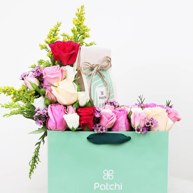 Petals And Chocolates Pink Flowers With Patchi Chocolate Bag - Flowers gift from Buy Any Flowers Dubai in Al Quoz Industrial Area 4, Dubai, UAE - image 2