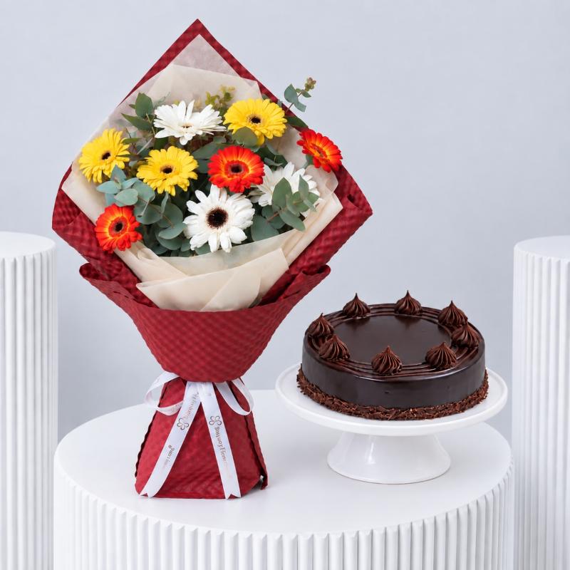 Glow Gerberas and Chocolate Cake - Gift Sets gift from Buy Any Flowers Dubai in Al Quoz Industrial Area 4, Dubai, UAE