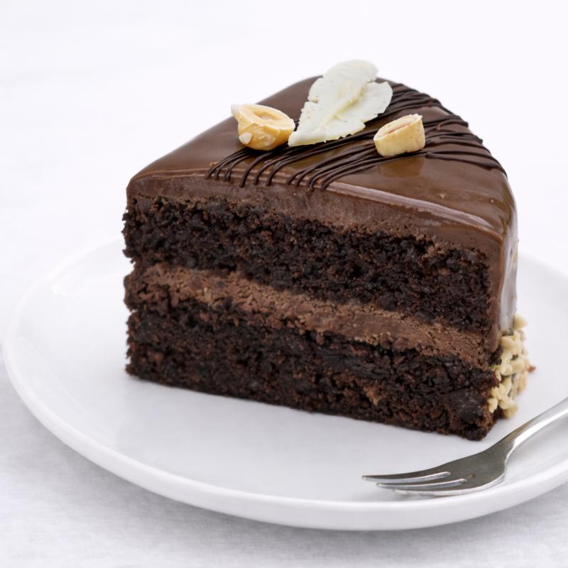 Yummy Chocolate Hazelnut Cake 4 Portion - Cakes gift from Buy Any Flowers Dubai in Al Quoz Industrial Area 4, Dubai, UAE - image 4