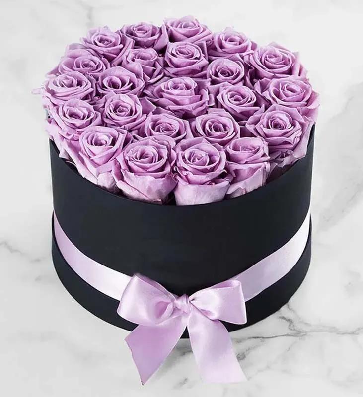 purple-roses-in-black-round-box_1.webp