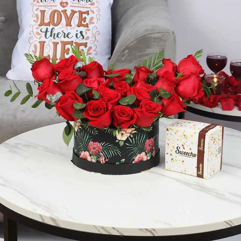 Love 21 Red Roses in Floral Print Box and Sweecho Chocolates 250gm in Dubai