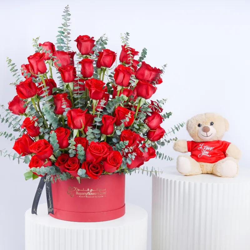 Scarlet Grandeur 51 Red Roses Signature Box and Teddy - Gift Sets gift from Buy Any Flowers Dubai in Al Quoz Industrial Area 4, Dubai, UAE