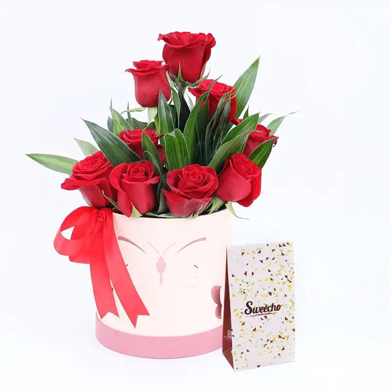 Innocence 9 Red Roses Box and Chocolates 100gm - Flowers gift from Buy Any Flowers Dubai in Al Quoz Industrial Area 4, Dubai, UAE